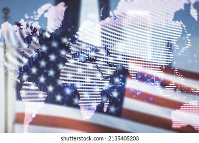 Multi exposure of abstract creative digital world map hologram on USA flag and blurry skyscrapers background, research and analytics concept