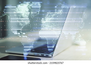 Multi exposure of abstract creative digital world map on modern laptop background, tourism and traveling concept