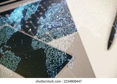 Multi exposure of abstract creative digital world map on laptop background, research and analytics concept