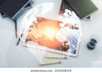Multi exposure of abstract creative digital world map and modern digital tablet on background, top view, tourism and traveling concept