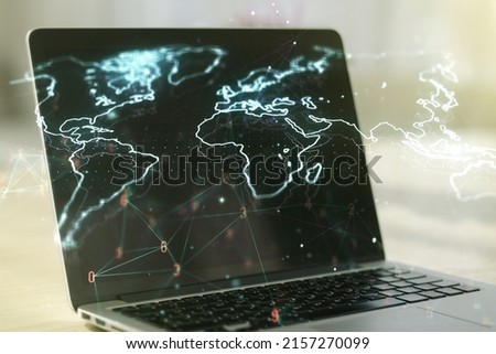 Multi exposure of abstract creative digital world map on modern laptop background, tourism and traveling concept