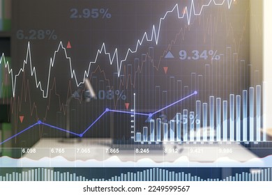 Multi exposure of abstract creative financial chart and modern desktop with laptop on background, research and analytics concept