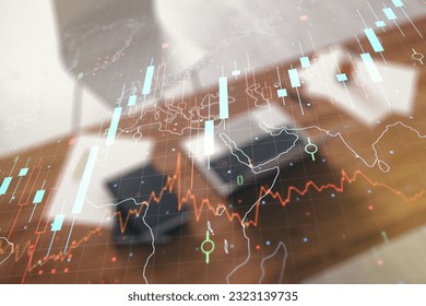 Multi exposure of abstract creative financial chart with world map and modern desktop with laptop on background, research and analytics concept