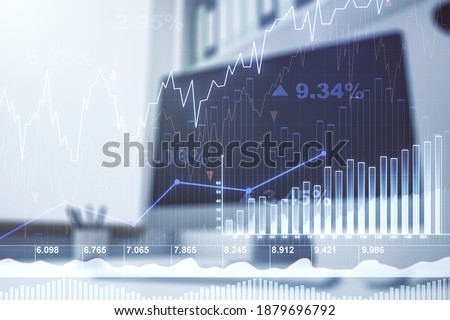 Multi exposure of abstract creative financial graph and modern desktop with computer on background, forex and investment concept