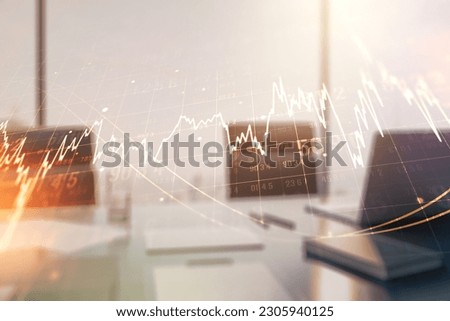 Multi exposure of abstract creative financial chart and modern desktop with laptop on background, research and analytics concept