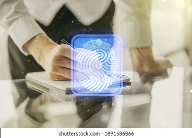 Multi exposure of abstract creative fingerprint illustration with man hand writing in notebook on background, digital access concept