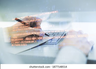 Multi exposure of abstract programming language hologram with hand writing in notepad on background with laptop, artificial intelligence and machine learning concept - Shutterstock ID 1877148514