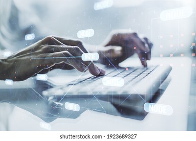 Multi exposure of abstract programming language hologram with hands typing on computer keyboard on background, artificial intelligence and machine learning concept