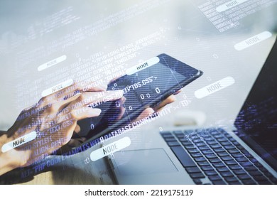 Multi exposure of abstract programming language hologram with world map and hand working with a digital tablet on background, artificial intelligence and neural networks concept