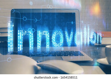 Multi exposure of computer on background and technology theme drawing. Concept of innovation.
