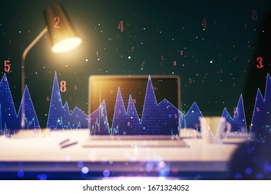 Multi exposure of creative statistics data hologram on laptop background, stats and analytics concept