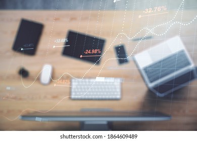 Multi exposure of creative statistics data hologram on laptop background, stats and analytics concept