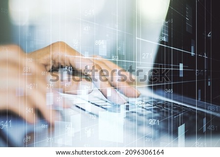 Multi exposure of creative statistics data hologram with hands typing on computer keyboard on background, stats and analytics concept