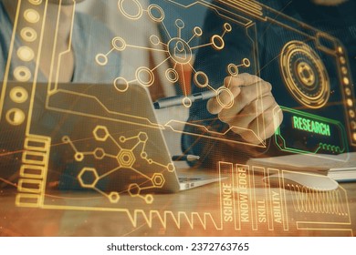 Multi exposure of data internet theme hologram with man working on computer on background. Concept of innovation.