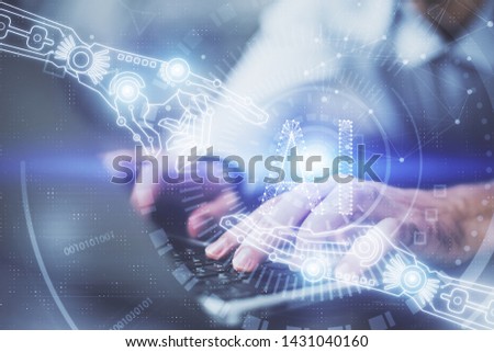 Multi exposure of data internet theme hologram with man working on computer on background. Concept of innovation.
