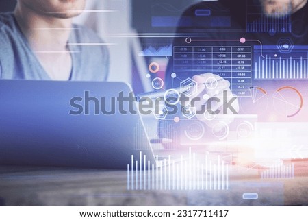 Multi exposure of data internet theme hologram with man working on computer on background. Concept of innovation.