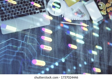 Multi exposure of data theme drawing hologram over topview work desk background with computer. Concept of technology.