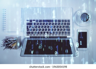 Multi exposure of data theme drawing hologram over topview work desk background with computer. Concept of technology.