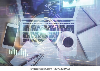 Multi exposure of data theme drawing hologram over topview work desk background with computer. Concept of technology.