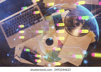 Multi exposure of data theme drawing hologram over topview work desk background with computer. Concept of technology.