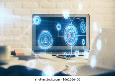 Multi exposure of desktop computer and technology theme hologram. Concept of software development.