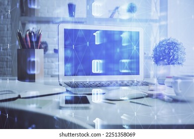 Multi exposure of desktop computer and technology theme hologram. Concept of software development.