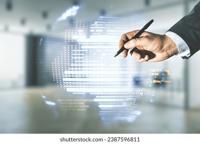 Multi exposure of developer's hand with pen working with abstract software development hologram and world map on blurred office background, global research and analytics concept