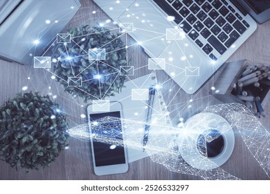Multi exposure of envelop technology theme drawing over table with phone. Top view. Concept of electronic mail.
