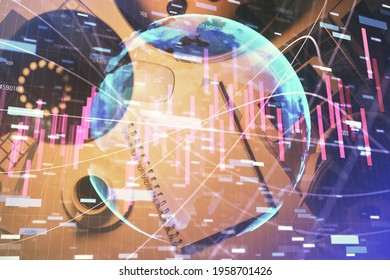 Multi exposure of forex chart drawing and work table top veiw. Concept of financial analysis.