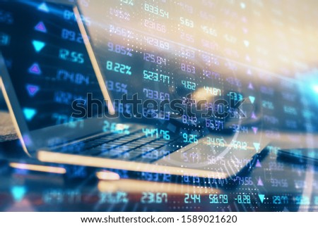 Multi exposure of forex chart and work space with computer. Concept of international online trading.