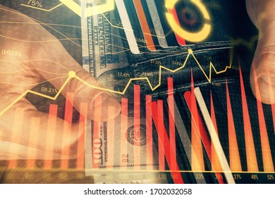 Multi exposure of forex graph drawing hologram and USA dollars bills and man hands. Technical Analysis concept.