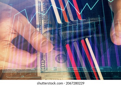 Multi exposure of forex graph drawing hologram and USA dollars bills and man hands. Technical Analysis concept.