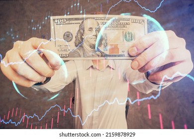 Multi exposure of forex graph drawing hologram and USA dollars bills and man hands. Technical Analysis concept. - Shutterstock ID 2159878929
