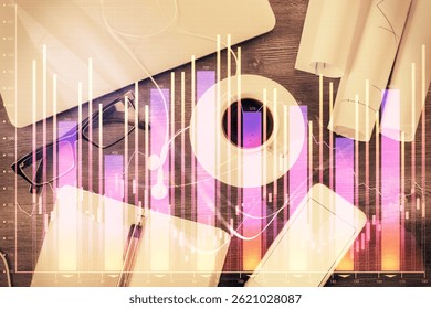 Multi exposure of forex graph drawing over desktop background with computer. Concept of financial analysis. Top view.