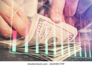 Multi exposure of forex graph drawing hologram and USA dollars bills and man hands. Technical Analysis concept.