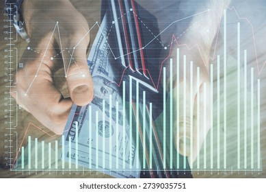 Multi exposure of forex graph drawing hologram and USA dollars bills and man hands. Technical Analysis concept.