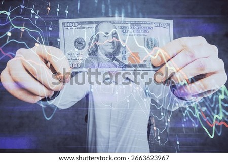 Multi exposure of forex graph drawing hologram and USA dollars bills and man hands. Technical Analysis concept.