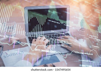 Multi exposure of forex graph with man working on computer on background. Concept of market analysis. - Shutterstock ID 1547495654