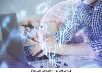 Multi exposure of forex graph with man working on computer on background. Concept of market analysis.