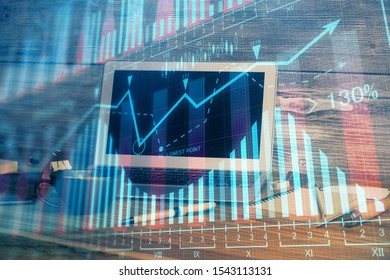 Multi exposure of forex graph and work space with computer. Concept of international online trading.