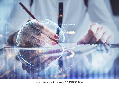 Multi exposure of hands making notes with world map hologram and data theme icons. Concept of global data.