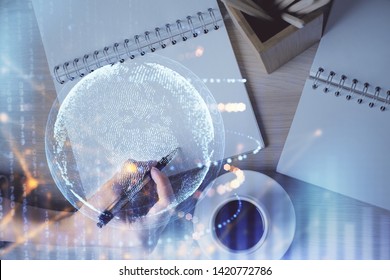 Multi exposure of hands making notes with world map hologram and data theme icons. Concept of global data.