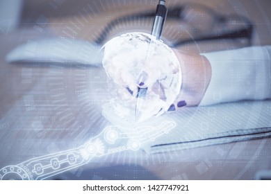 Multi exposure of hands making notes with world map hologram and data theme icons. Concept of global data.