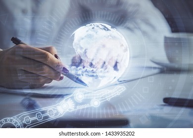 Multi exposure of hands making notes with world map hologram and data theme icons. Concept of global data.