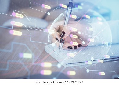 Multi exposure of hands making notes with world map hologram and data theme icons. Concept of global data.