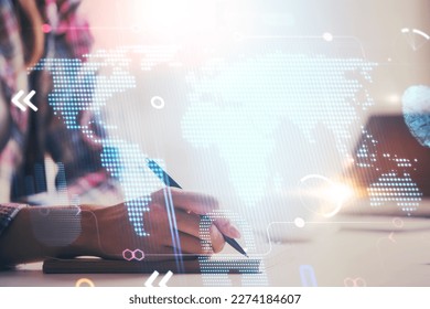 Multi exposure of hands making notes with world map hologram and data theme icons. Concept of global computer data.
