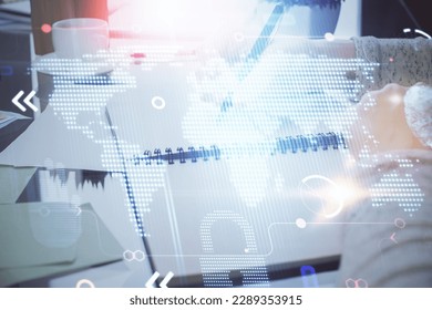 Multi exposure of hands making notes with world map hologram and data theme icons. Concept of global computer data.