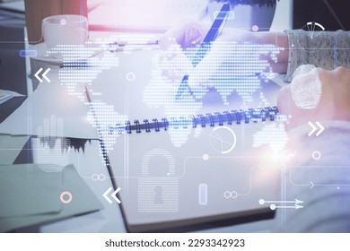 Multi exposure of hands making notes with world map hologram and data theme icons. Concept of global computer data.