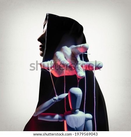 Multi exposure image. Silhouette of woman in cloak and marionette on the string. Concept of control.