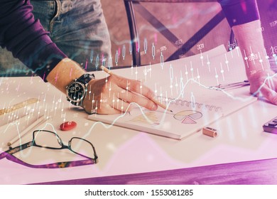 Multi exposure of man hands with stock market forex graph.